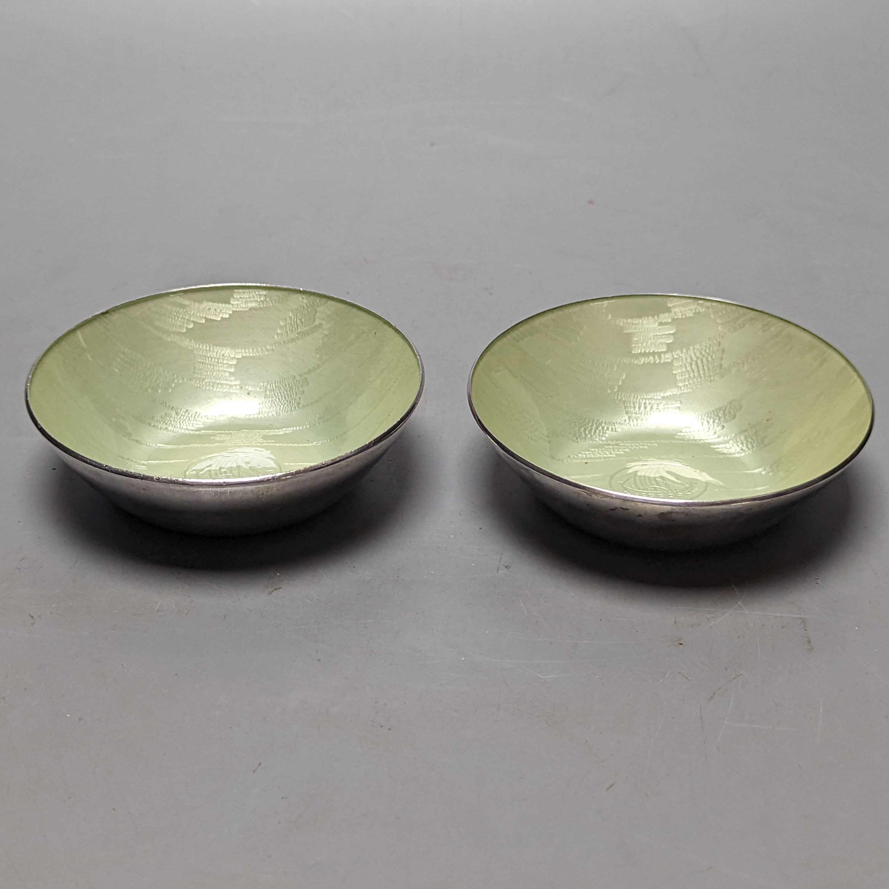 A pair of 20th century Norwegian sterling and and green enamel dishes, by J. Tostrup, diameter 96mm, gross 169 grams.